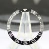 Rolex 116710 bezel