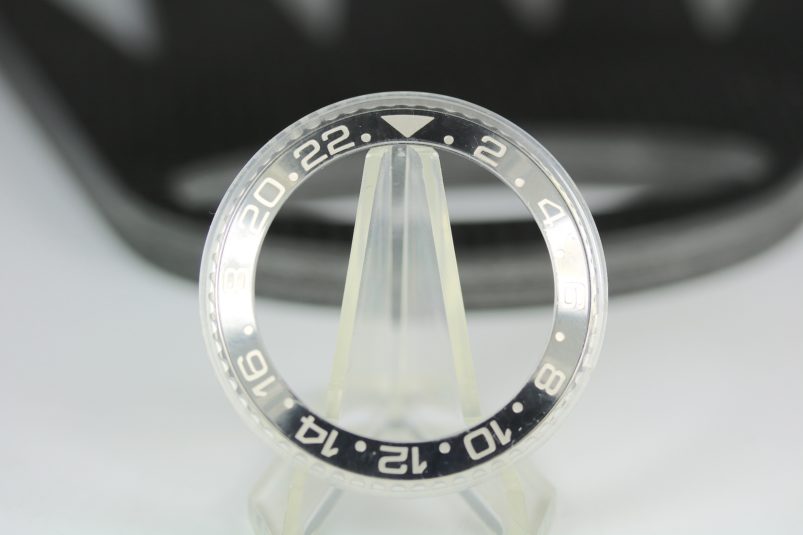 Rolex 116710 bezel