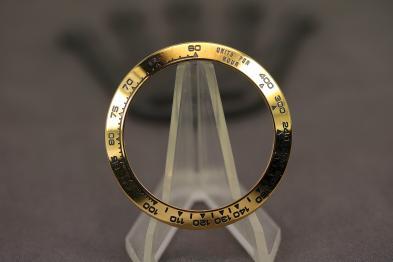 Rolex 116528 bezel