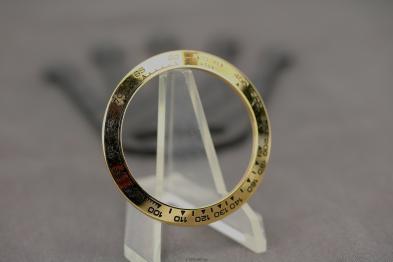 Rolex 116528 bezel